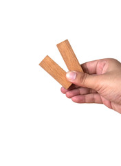 man hand holding toy wood, isolated on white background.