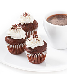 Chocolate muffins and cup of coffee