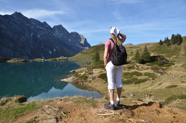 Traveler enjoying alpine view. Switzerland