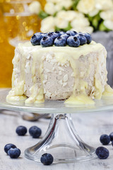 White chocolate cake decorated with blueberries