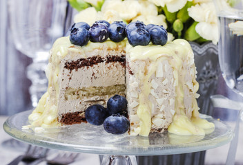 White chocolate cake decorated with blueberries