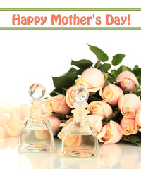 Beautiful bouquet of roses and perfume, isolated on white