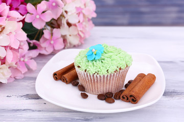 Tasty cupcake with butter cream,