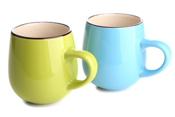 Colorful cups isolated on white