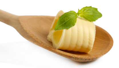 Curl of fresh butter with basil