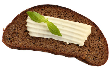 Slice of rye bread with butter, isolated on white