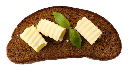 Slice of rye bread with butter, isolated on white