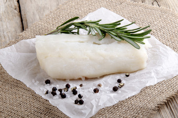 cod with rosemary on kitchen paper