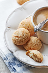 Biscotti and a cup of coffee on a plate