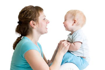 Happy mother having fun with her baby boy