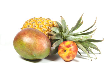Pineapple Nectarine And Ripe Tropical Mango On White