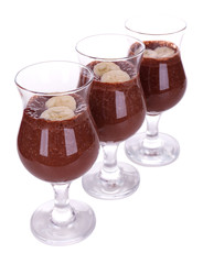 Cocktails with banana and chocolate isolated on white