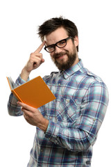 Young Man Reading Book and Gesturing