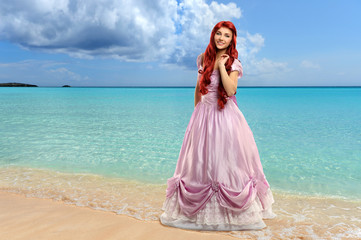 Fototapeta na wymiar Woman Dressed as Princess by the Ocean