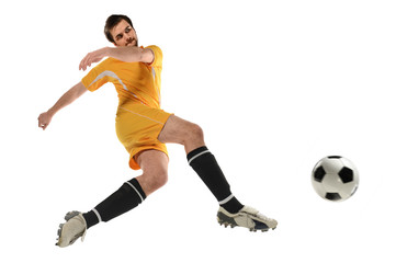 Fototapeta na wymiar Soccer Player Kicking Ball