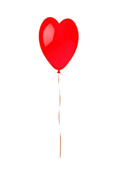 Red flying balloon looking like heart symbol isolated on white
