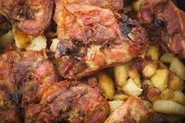 roasted chicken drumsticks with potatoes and spices