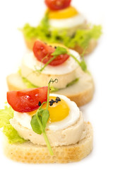 canape with meat vegetables and seafood
