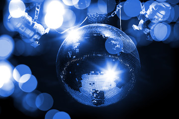 Blue disco background with mirror ball and lights