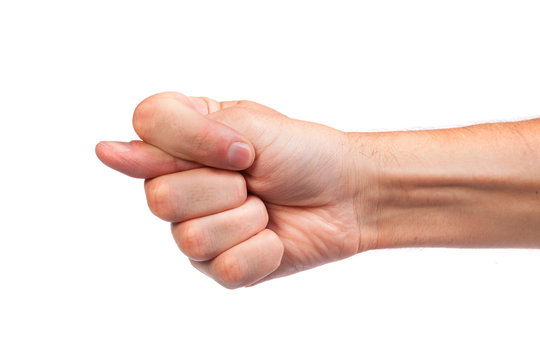 Hand is showing a fig sign isolated on white