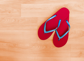 Beach shoes, flip flops - red and blue glitter, holiday backgrou