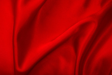 Naklejka na ściany i meble Red silk fabric background