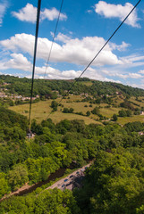 Cable cart aerial view of fields and trees at Matlock