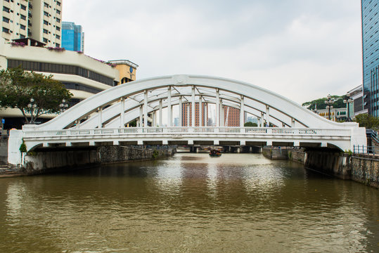 Singapore financial district framed by Elgin Bridge