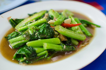 Fried kale and vegetables in oyster sauce