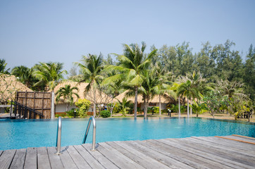 Fototapeta premium Swimming pool in tropical style resort
