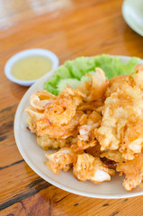 Deep fried fresh squid and seafood with sauce