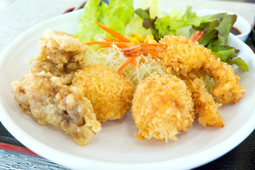 Set of japanese food (tempura, tonkatsu, karake and miso soup)