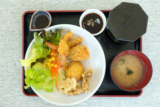 Set of japanese food (tempura, tonkatsu, karake and miso soup)