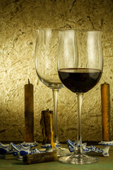 red wine and glass on a old paper background