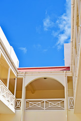 Fragment of a side a house against the blue sky