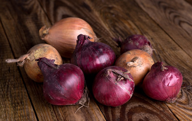 Onion on old, wooden table, shallow depth of field
