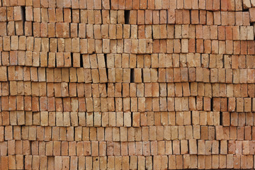 Red bricks laid into the wall