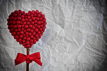 Red heart made of small balls