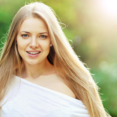 Outdoor portrait of beautiful girl face - closeup