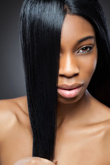 Beautiful black woman with long straight hair © and.one