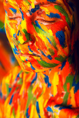 girl in colourful paint strokes
