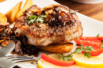 Pork chop with mushrooms and chips