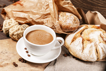 Milk coffee and homemade loaves of bread