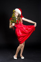 cute teen girl in santa claus costume