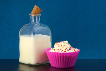 milk and whipped cream with colored sugar