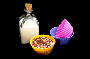 cupcake with bottle of milk