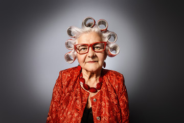 grandma with curlers - obrazy, fototapety, plakaty