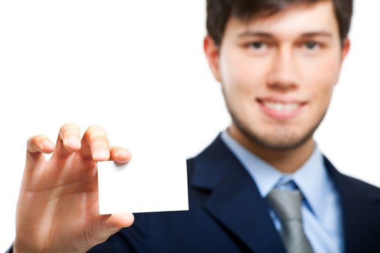 Smiling Businessman Holding A Blank Card