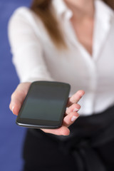 Woman showing a mobile phone