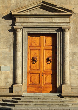 monumental door to the Palazzo Bartolini Salimbeni in Florence